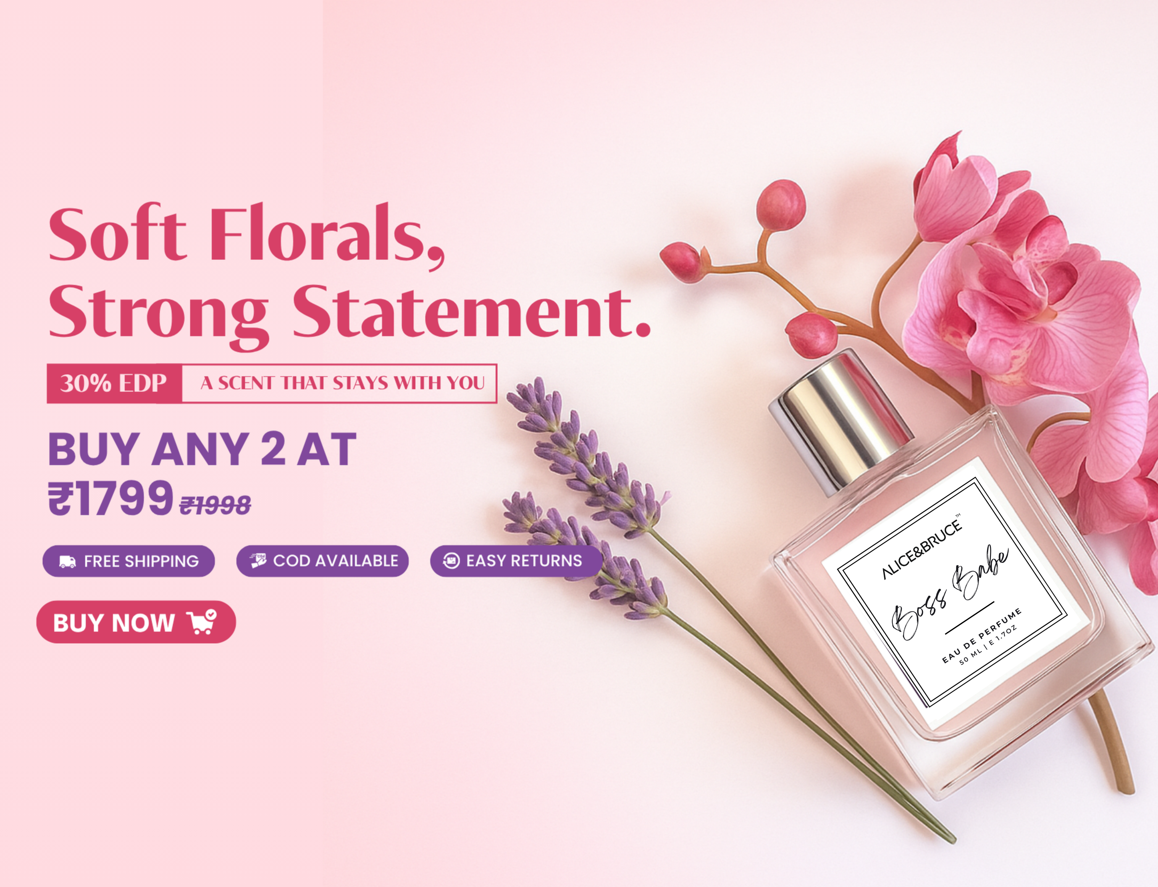 Alice and Bruce Boss Babe Perfume – elegant stiletto-shaped bottle with flowers on a pink background, featuring promotional text.